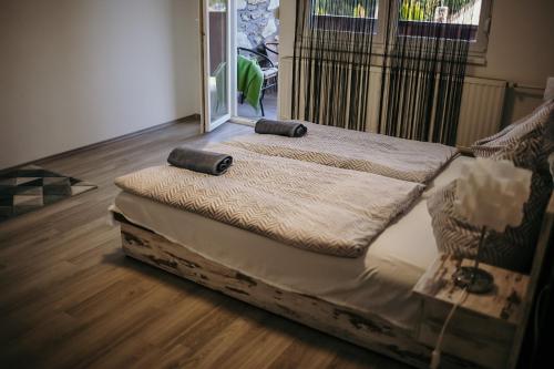 two mattresses sitting on the floor in a room at Vár Park Panzió in Sárvár