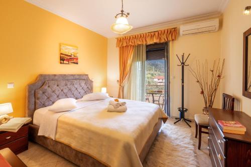 Postel nebo postele na pokoji v ubytování Hotel Eirini