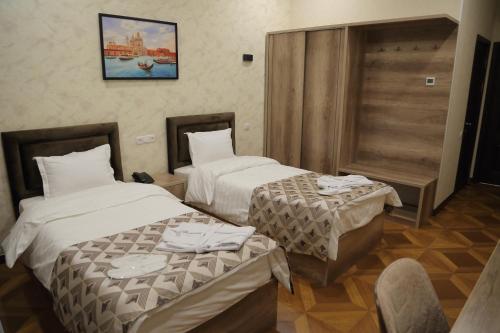 Letto o letti in una camera di Hotel 1946