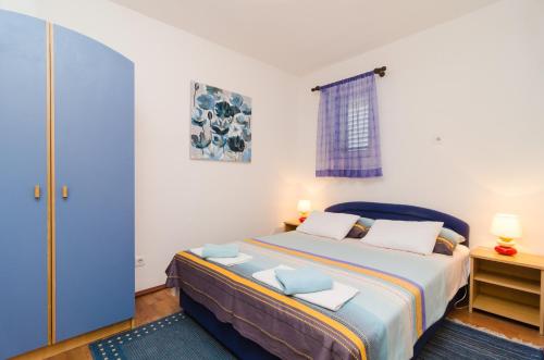 Cama o camas de una habitación en Apartment ADEA