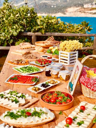 a table full of appetizers and food on a table at Club Hotel Barbarossa in Kas