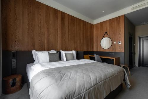 Ein Bett oder Betten in einem Zimmer der Unterkunft Potocki Boutique Hotel