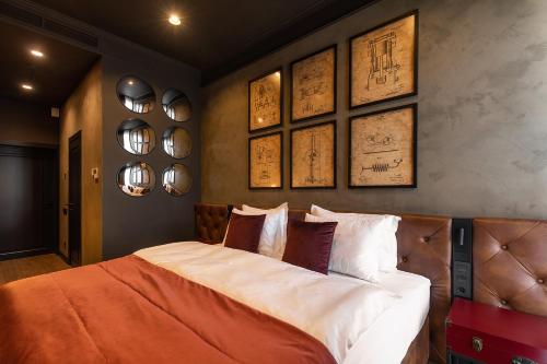 Ein Bett oder Betten in einem Zimmer der Unterkunft Potocki Boutique Hotel