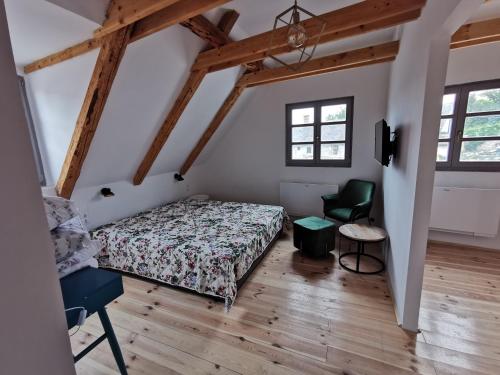 Postel nebo postele na pokoji v ubytování Fügekert - Bed&Wine