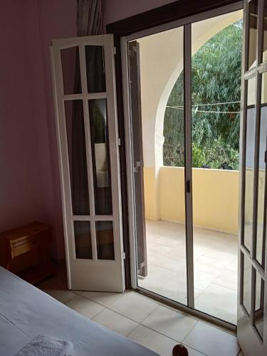 an open sliding glass door with a view of a balcony at Santa Maria in Vitalades