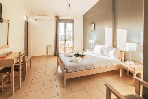 A bed or beds in a room at Villa Krini