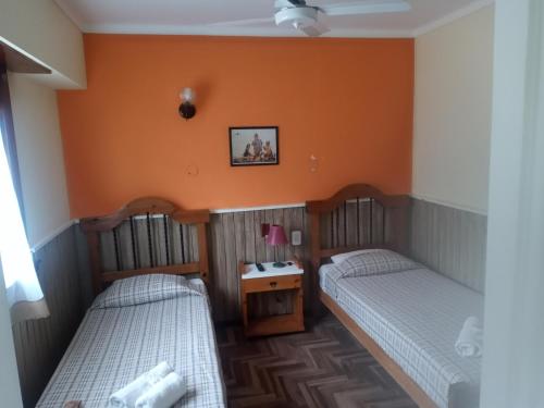 Una cama o camas en una habitación de Hotel Sahara