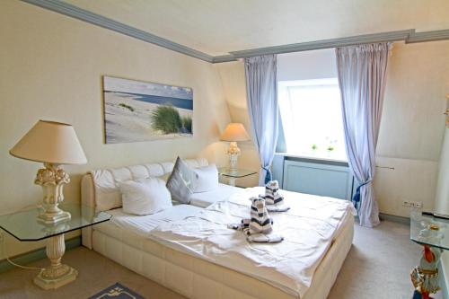 Ένα ή περισσότερα κρεβάτια σε δωμάτιο στο Seaside, Whg 30