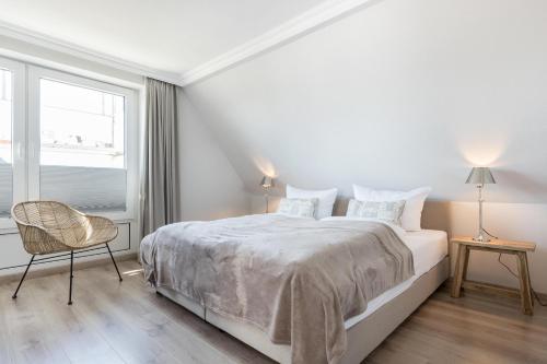 Ένα ή περισσότερα κρεβάτια σε δωμάτιο στο Haus Weissenburg, Whg OG West