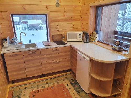 Kuchyň nebo kuchyňský kout v ubytování Päevatalu Camping