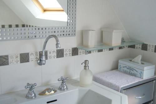 Kúpeľňa v ubytovaní Au Fond du Jardin Maison d'hôtes
