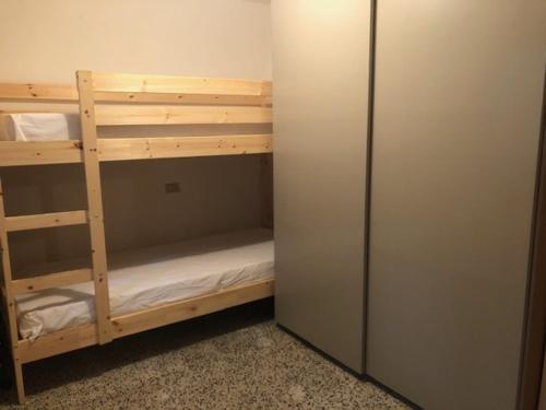Poschodová posteľ alebo postele v izbe v ubytovaní Terra Roccaraso