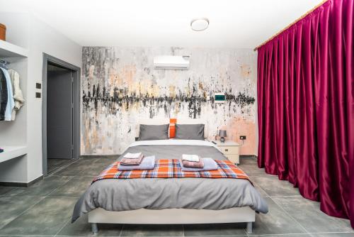 Chardonnay Guest Studio Rooms with Great view for nature lovers tesisinde bir odada yatak veya yataklar