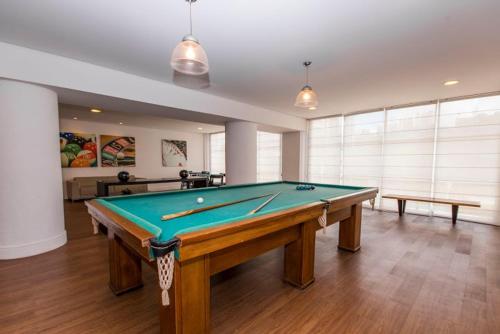 a billiard room with a pool table in it at Maximus Luxury in NYC Berrini in Sao Paulo