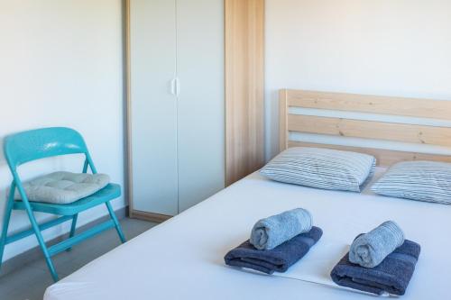 Postel nebo postele na pokoji v ubytování Seasidelongo Houses 1 min from the beach of Nikiti