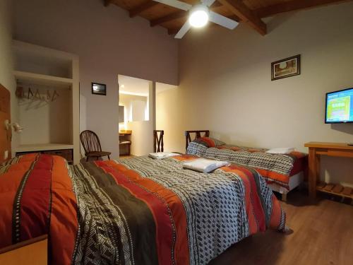 A bed or beds in a room at Departamentos Lonquimay