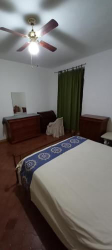Ένα ή περισσότερα κρεβάτια σε δωμάτιο στο Trilocale Margine Rosso