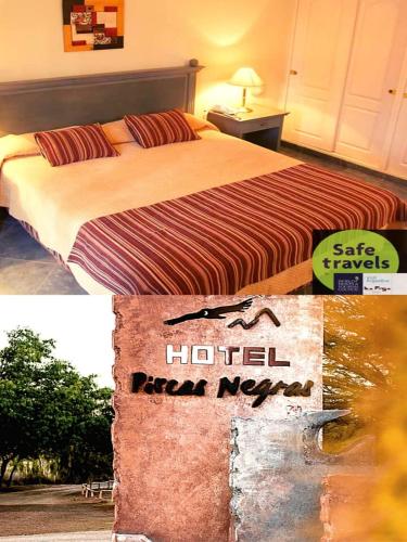Ένα ή περισσότερα κρεβάτια σε δωμάτιο στο Hotel Pircas Negras