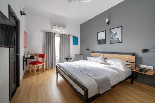 Łóżko lub łóżka w pokoju w obiekcie Loft 24, Mansarovar