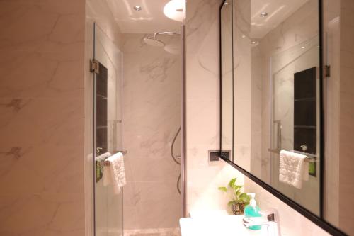 Koupelna v ubytování Kezan Condo Hotel