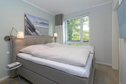 Postel nebo postele na pokoji v ubytování Haffkamp 23 Wohnung 4