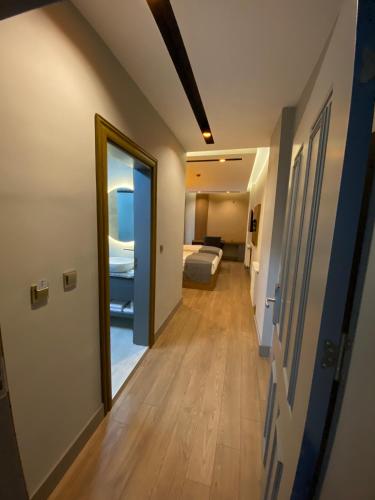 Katil atau katil-katil dalam bilik di Sarıkamış Aras Otel