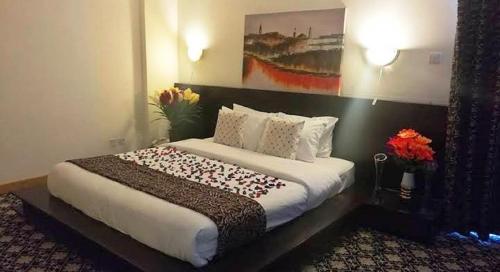 Phoenicia Tower Hotel And Spaにあるベッド