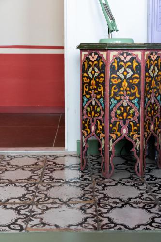 a colorful table in a room with a floor at Marina Piccola 73 in Sorrento