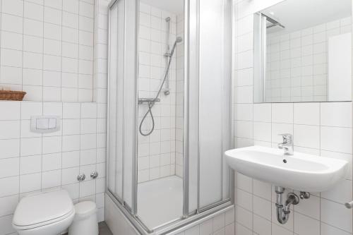 Ett badrum på Gutshaus Landwert Hof