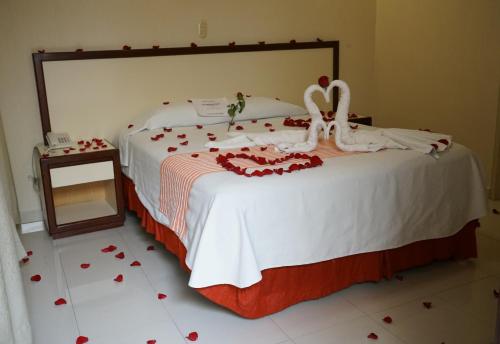 Кровать или кровати в номере Hotel Santa Rosa
