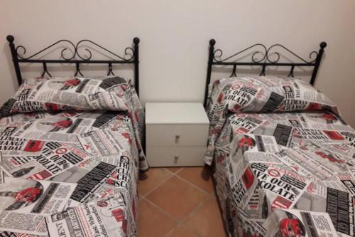 
A bed or beds in a room at Appartamento Casa Rossa
