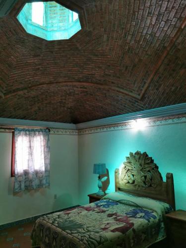 Postel nebo postele na pokoji v ubytování Posada Casa del Minero