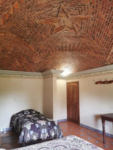 Postel nebo postele na pokoji v ubytování Posada Casa del Minero