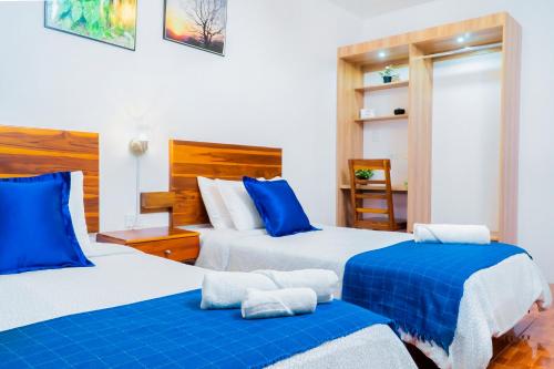 Postel nebo postele na pokoji v ubytování Hotel Boutique Platanal