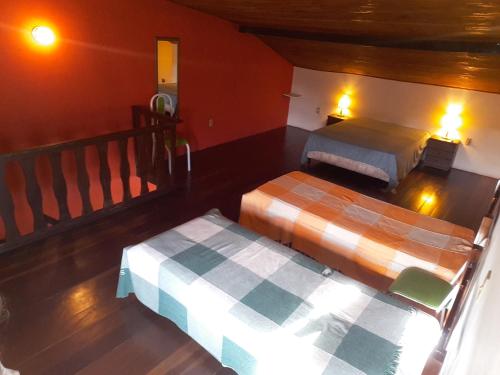 Кровать или кровати в номере Apartamento familiar centro de Buzios
