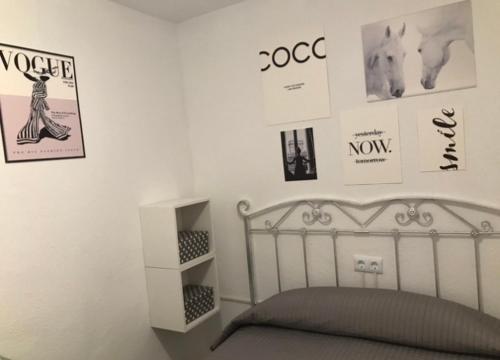 A bed or beds in a room at APARTAMENTO SOL Y PLAYA