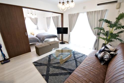 Ruang duduk di オーシャンテラス瀬底 Room101