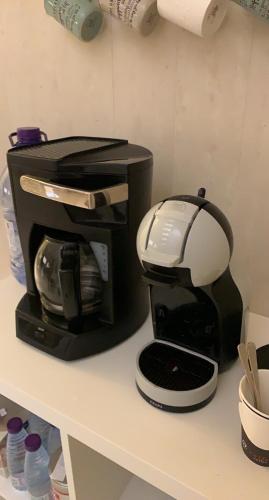 a coffee maker sitting on top of a counter at Luxury fully furnished villa ڤيلا مؤثثة in AlUla