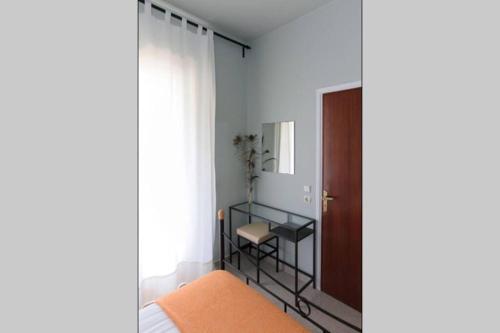 Ένα ή περισσότερα κρεβάτια σε δωμάτιο στο Villa Tsampika