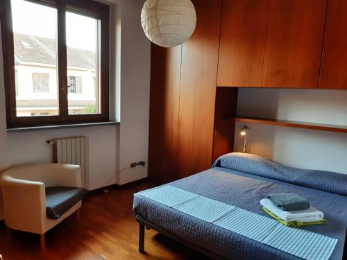 Posteľ alebo postele v izbe v ubytovaní B&B Il Glicine di Basiglio