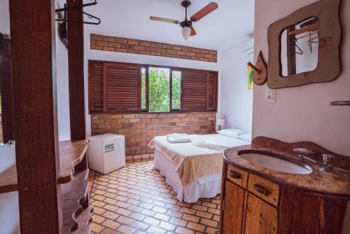 Um banheiro em Pousada Alto do Cajueiro