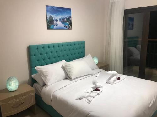 Postel nebo postele na pokoji v ubytování Hurghada Furnished Appratment - Al Dau Hights Al Mamsha