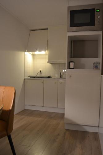 Dapur atau dapur kecil di Bed & Breakfast Boszicht Leeuwarden