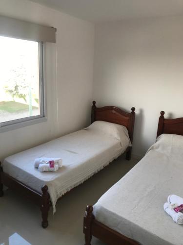Rúm í herbergi á Duplex Parque