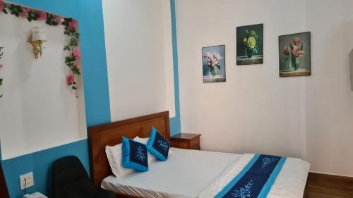 Postel nebo postele na pokoji v ubytování LẠI NGUYỄN BOUTIQUE HOTEL