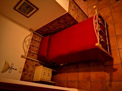 Un pat sau paturi într-o cameră la Vecchia Roma Resort