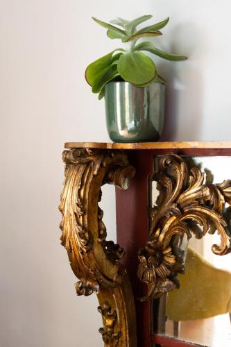 a plant in a vase sitting on top of a table at Marina Piccola 73 in Sorrento