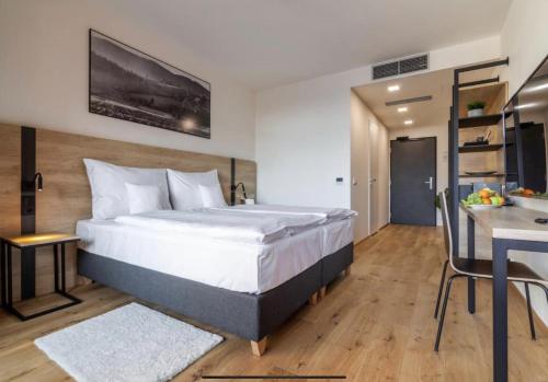 Postel nebo postele na pokoji v ubytování Golf House Čeladná