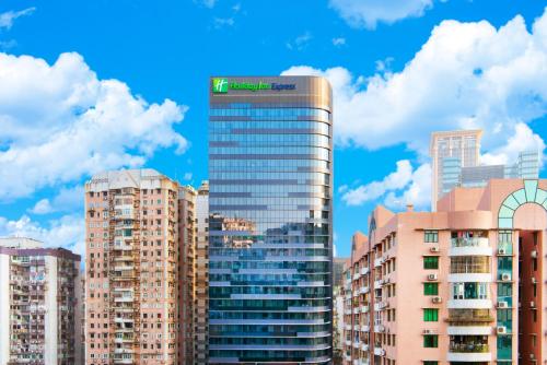 a group of tall buildings in a city at Holiday Inn Express Macau City Centre by IHG in Macau