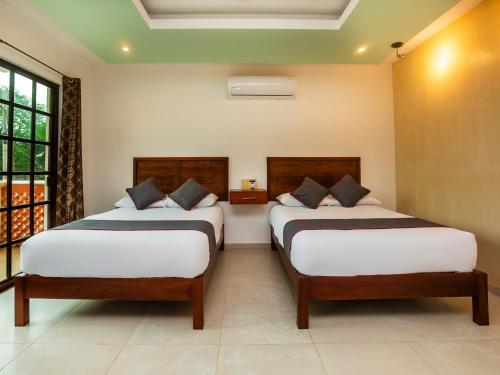 Hotel Beach Don Gonzaloにあるベッド